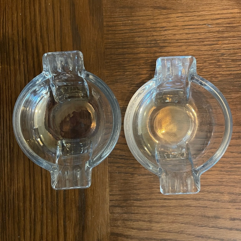 Two older glass ashtrays